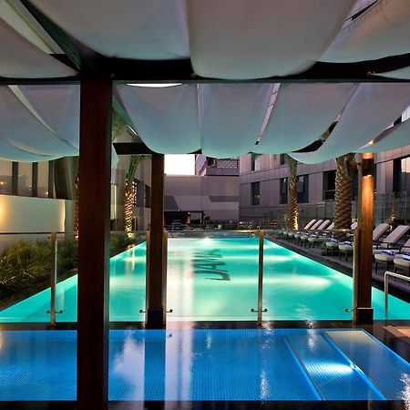 Damac Maison The Vogue Dubai Esterno foto The pool at the hotel