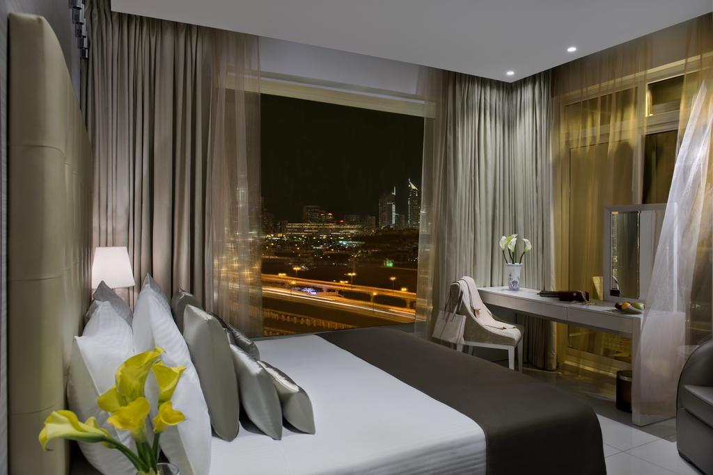 Damac Maison The Vogue Dubai Esterno foto A room at the hotel