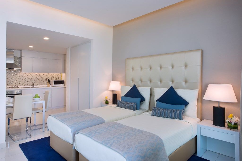 Damac Maison The Vogue Dubai Esterno foto A bedroom at the hotel