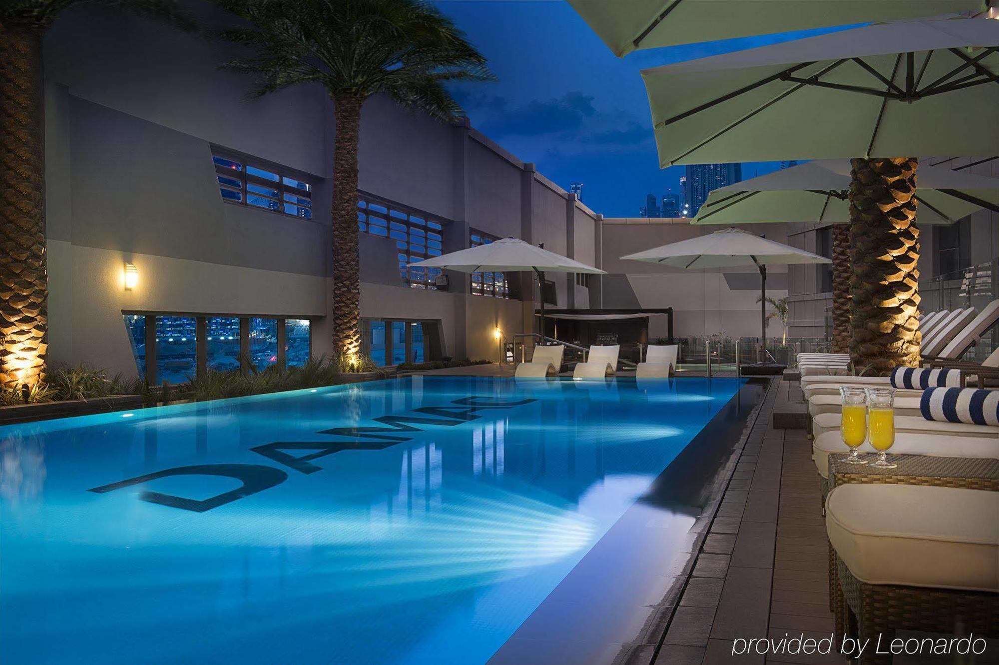 Damac Maison The Vogue Dubai Esterno foto The pool at the hotel