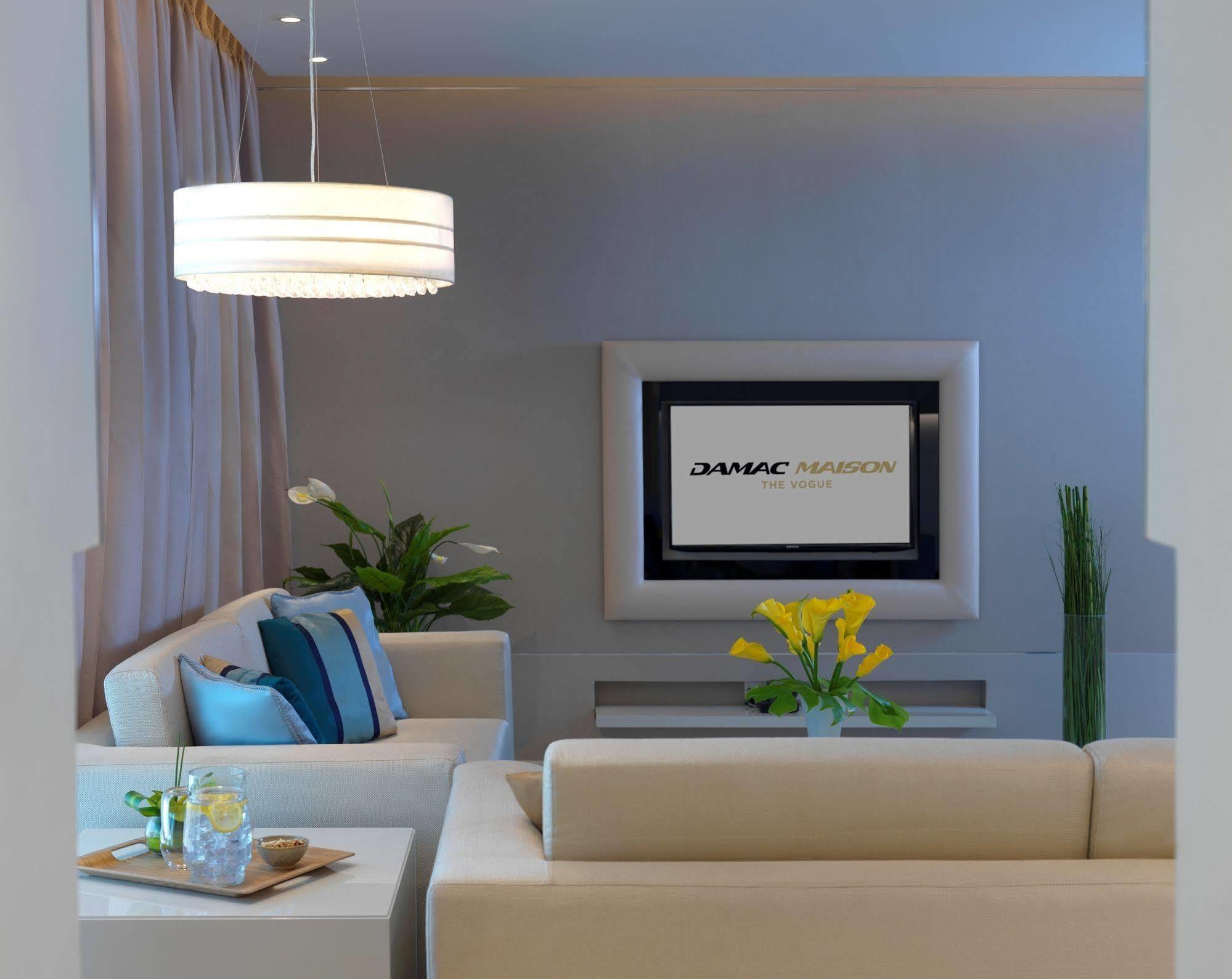 Damac Maison The Vogue Dubai Esterno foto A living room at the hotel