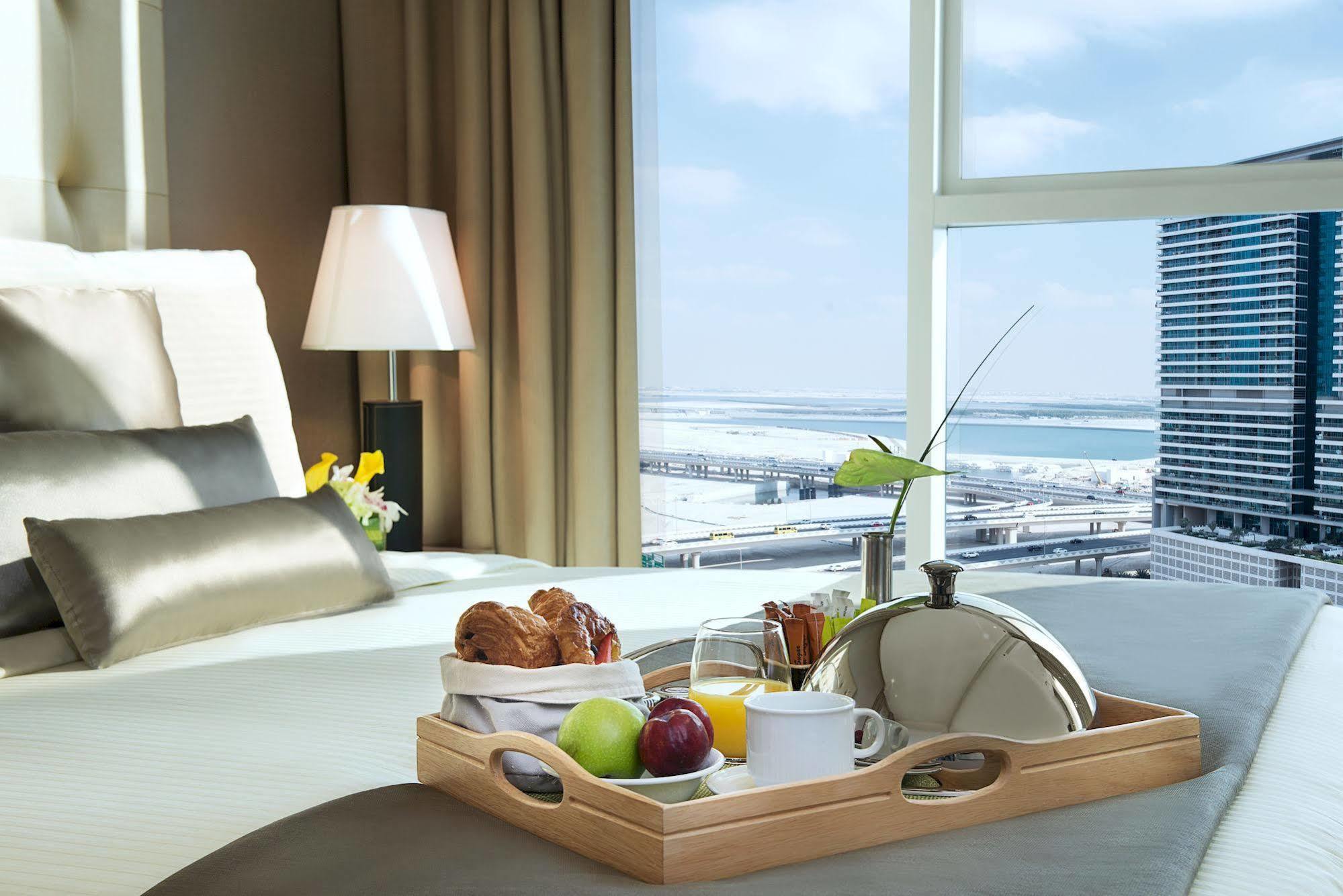 Damac Maison The Vogue Dubai Esterno foto A room service tray