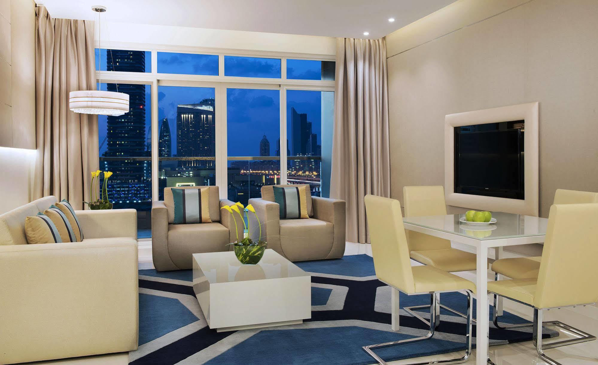 Damac Maison The Vogue Dubai Esterno foto A living room in a typical apartment