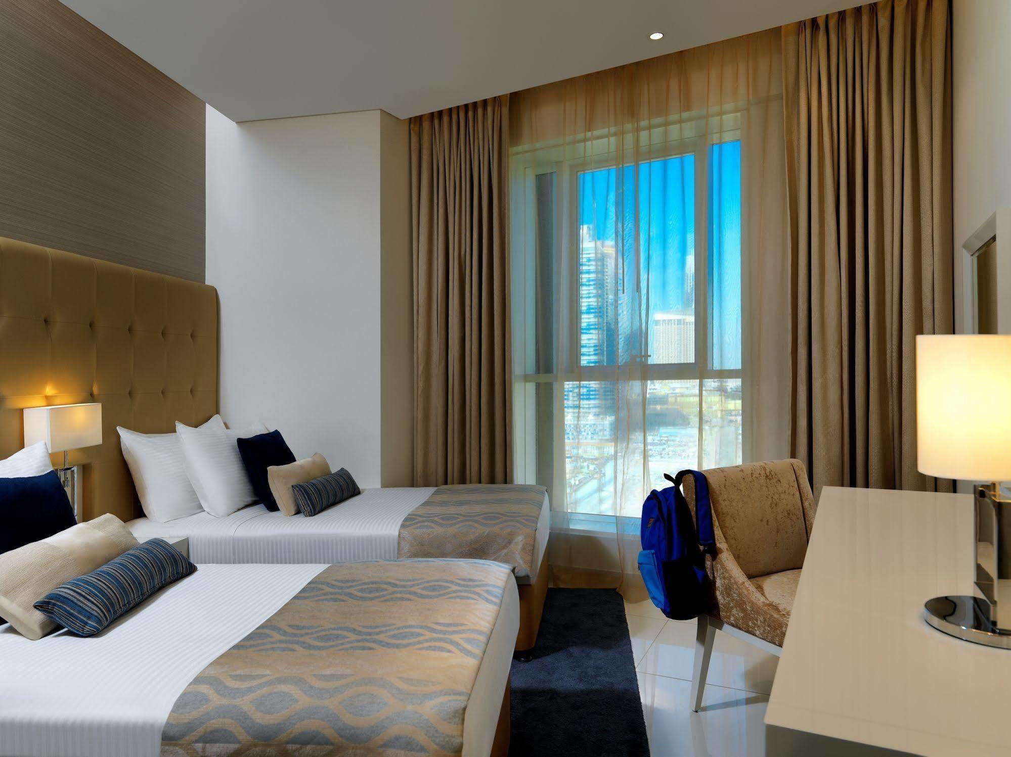 Damac Maison The Vogue Dubai Esterno foto A room at the hotel