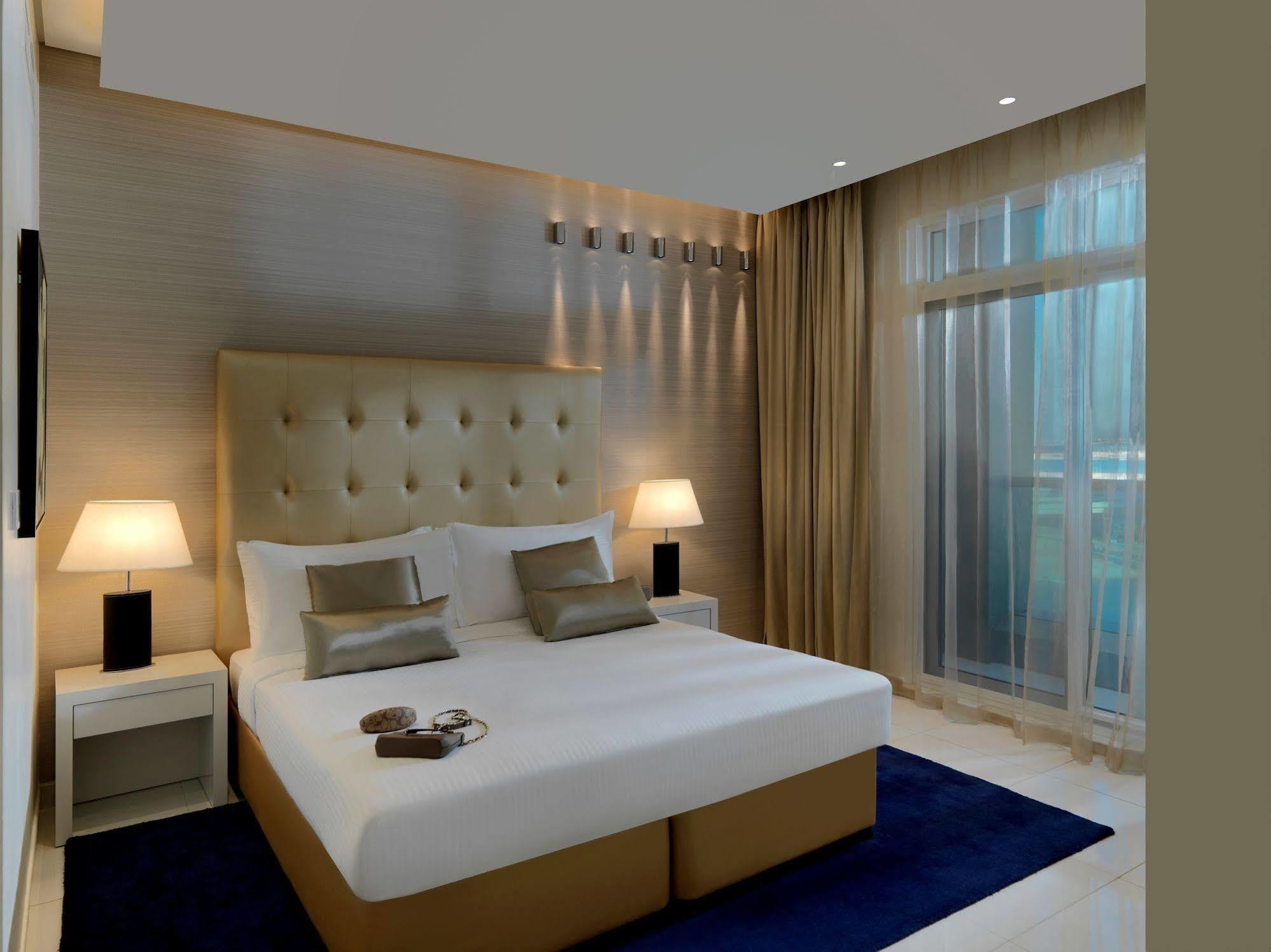 Damac Maison The Vogue Dubai Esterno foto A bedroom at the hotel