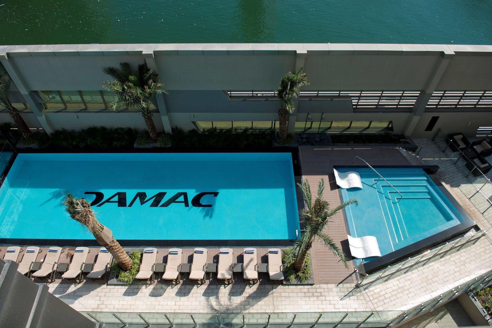 Damac Maison The Vogue Dubai Esterno foto The pool at the TAMAC headquarters